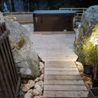 Réalisation création de l'aménagement extérieur en bois pour le spa à Itteville près de Brétigny