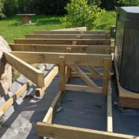 Réalisation creation terrasse amenagement exterieur pose spa detente jacuzzi longvilliers hydromassage