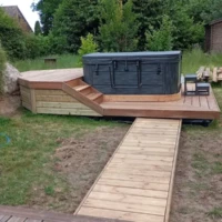 Réalisation creation terrasse amenagement exterieur pose spa detente jacuzzi longvilliers installation