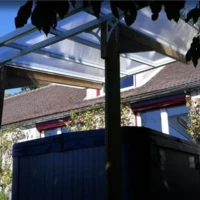 Réalisation Terrasse extérieure avec pergola bioclimatique en finition bois et spa intégré