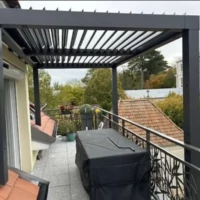 Réalisation pergola bioclimatique installée sur terrasse avec jacuzzi à Ballainvilliers sur mesure