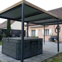 Réalisation pergola bioclimatique protégeant un spa exterieur de détente à étampes